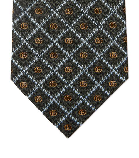 gucci double g pattern on tie|Silk tie with Double G detail in dark blue .